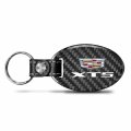 Ipick Image For Cadillac Xt5 Logo Black Real Carbon Fiber Oval Shape With Leather Strap Key Chain Keychain Exclusive Official