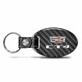 Ipick Image For Cadillac Ct4 Logo Black Real Carbon Fiber Oval Shape With Leather Strap Key Chain Keychain Exclusive Official