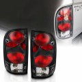 Amerilite Black Replacement Tail Lights For 95-00 Toyota Tacoma Pickup Truck- Passenger And Driver Side Bulb Harness Included