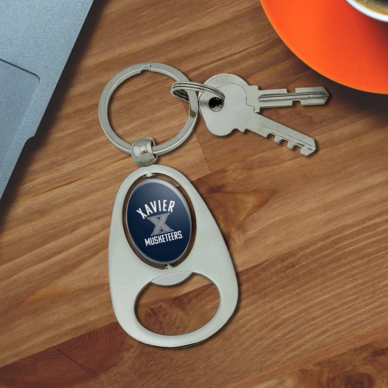 Graphics More Xavier University Musketeers Logo Keychain Chrome Metal Spinning Oval Bottle Opener