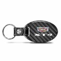 Ipick Image For Cadillac Xt4 Logo Black Real Carbon Fiber Oval Shape With Leather Strap Key Chain Keychain Exclusive Official